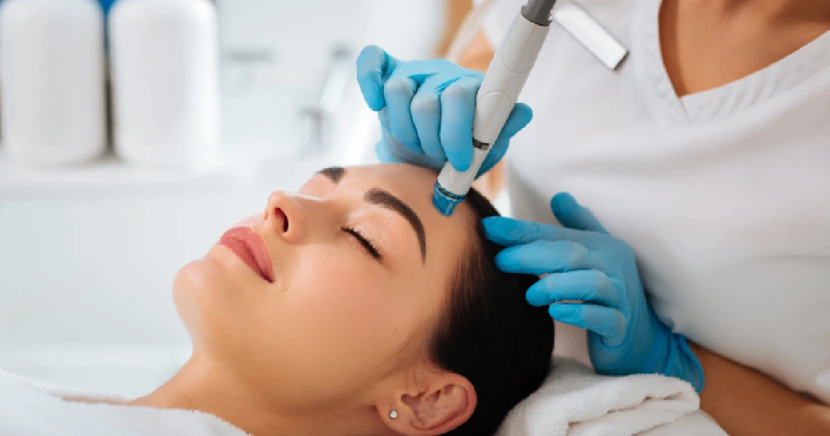 A woman receiving a HydraFacial® in Baton Rouge, LA-a--